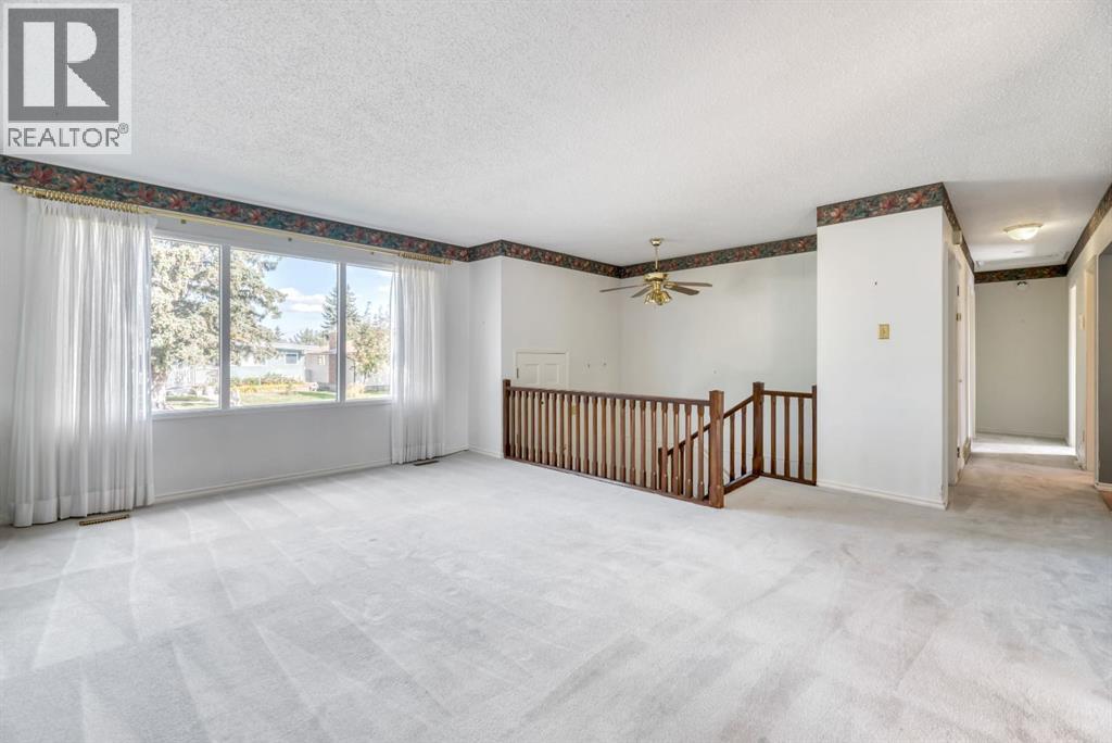 Single Family House Bi-level for Sale in  Brazeau Crescent SW Braeside Calgary 