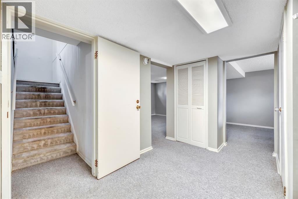 Single Family House Bi-level for Sale in  Brazeau Crescent SW Braeside Calgary 