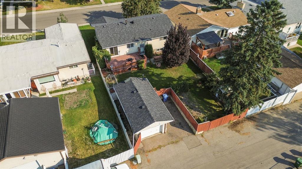 Single Family House Bi-level for Sale in  Brazeau Crescent SW Braeside Calgary 