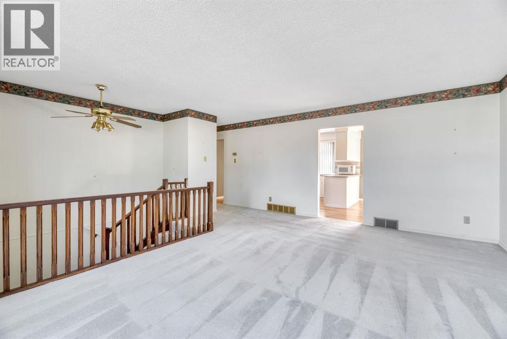 Single Family House Bi-level for Sale in  Brazeau Crescent SW Braeside Calgary 