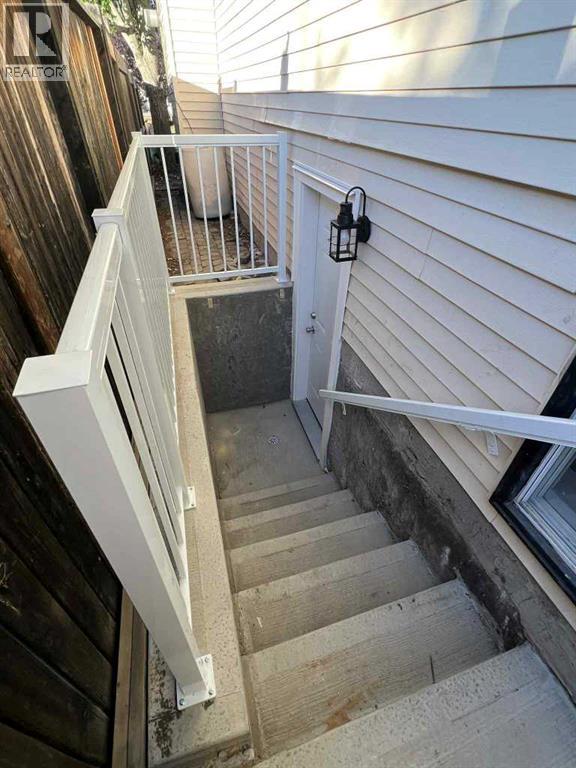 Single Family House Bi-level for Sale in  Shawfield Way SW Shawnessy Calgary 