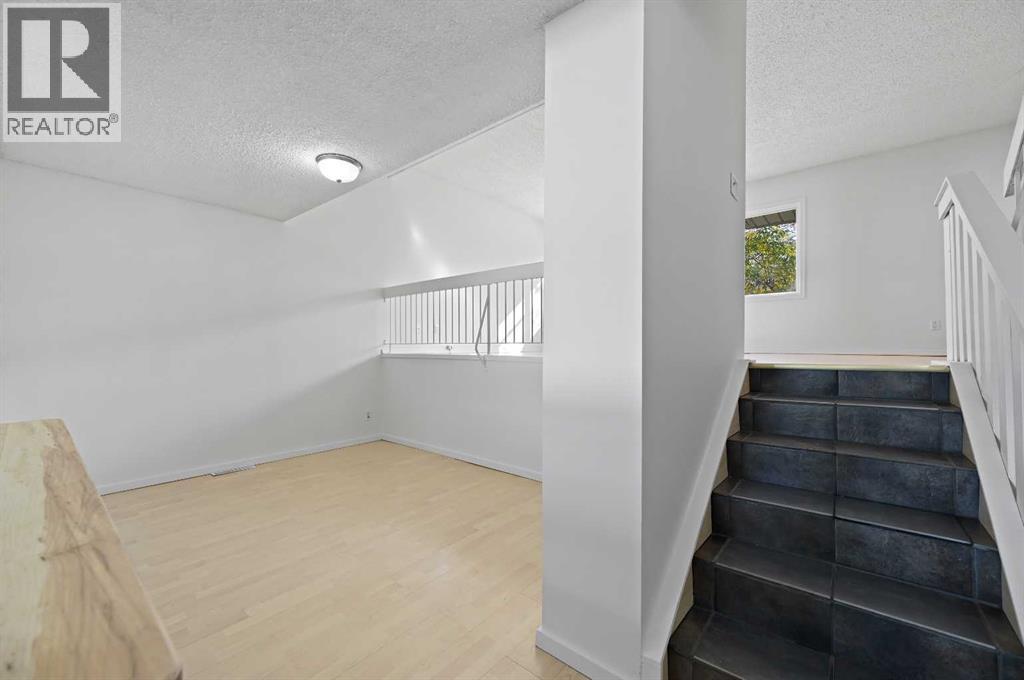 Single Family House 4 Level for Sale in  Brae Glen Court SW Braeside Calgary 