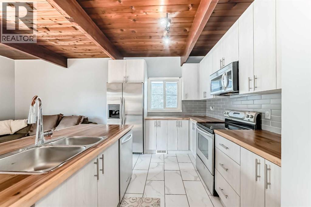 Single Family House Bi-level for Sale in   Avenue NW Bowness Calgary 