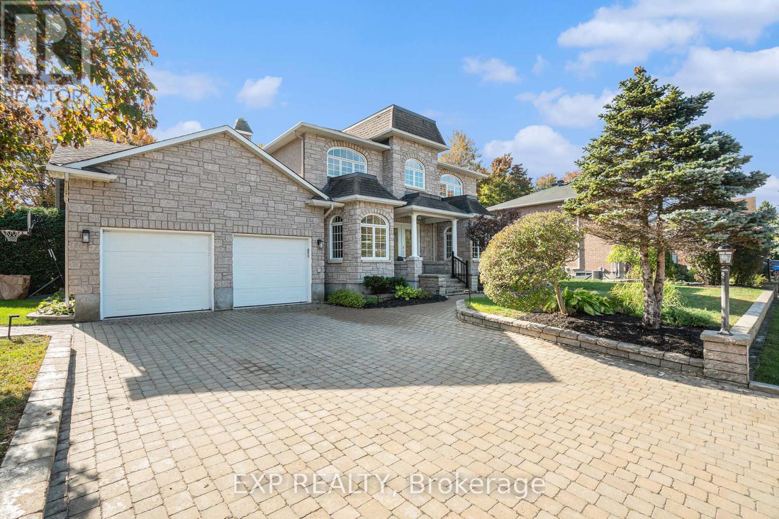 Landscaped driveway and around the house.
