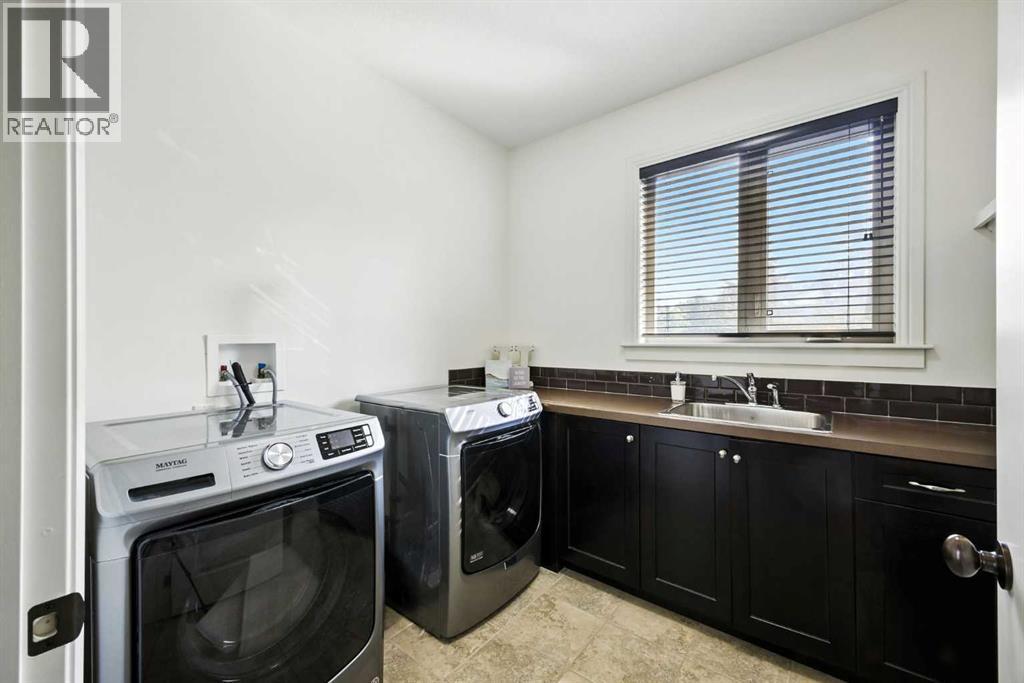 Single Family House for Sale in  Posthill Drive SW Springbank Hill Calgary 