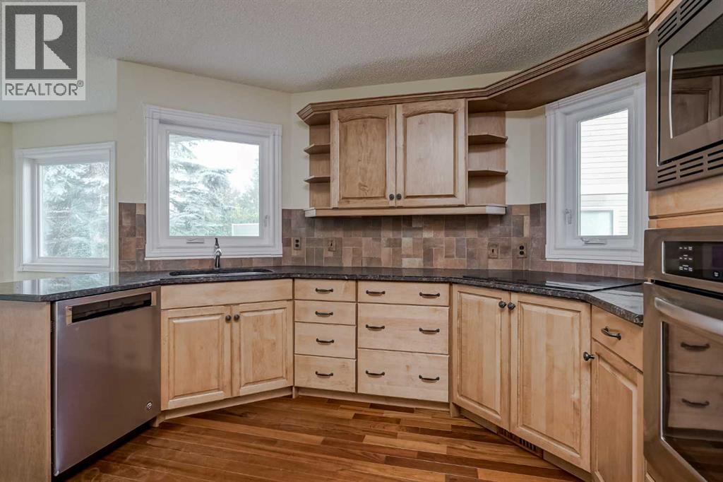Single Family House Bungalow for Sale in  Hawkview Manor Place NW Hawkwood Calgary 