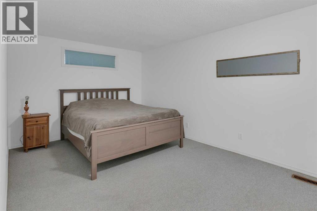 Single Family House Bungalow for Sale in  Christie Gardens SW Christie Park Calgary 