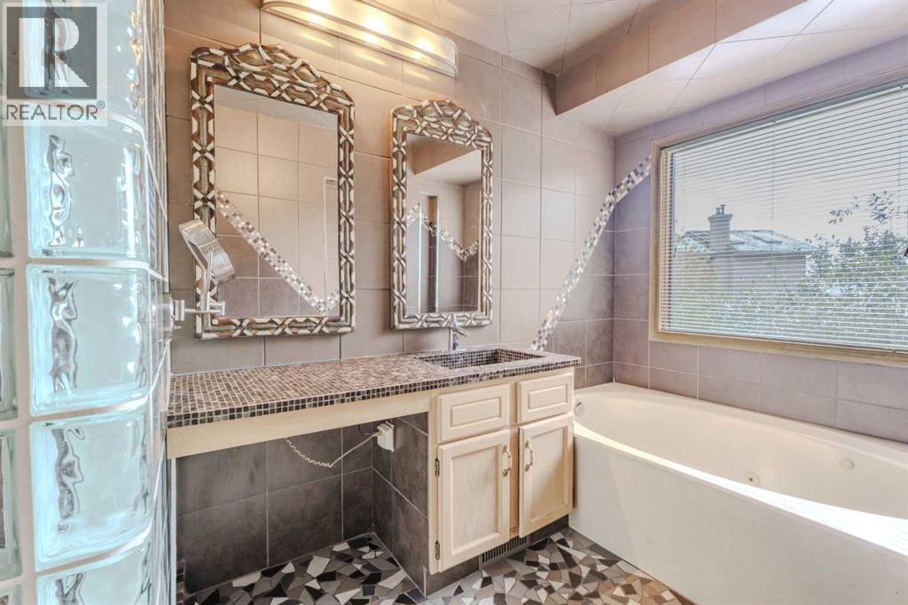 Single Family House for Sale in  Canterbury Court SW Canyon Meadows Calgary 