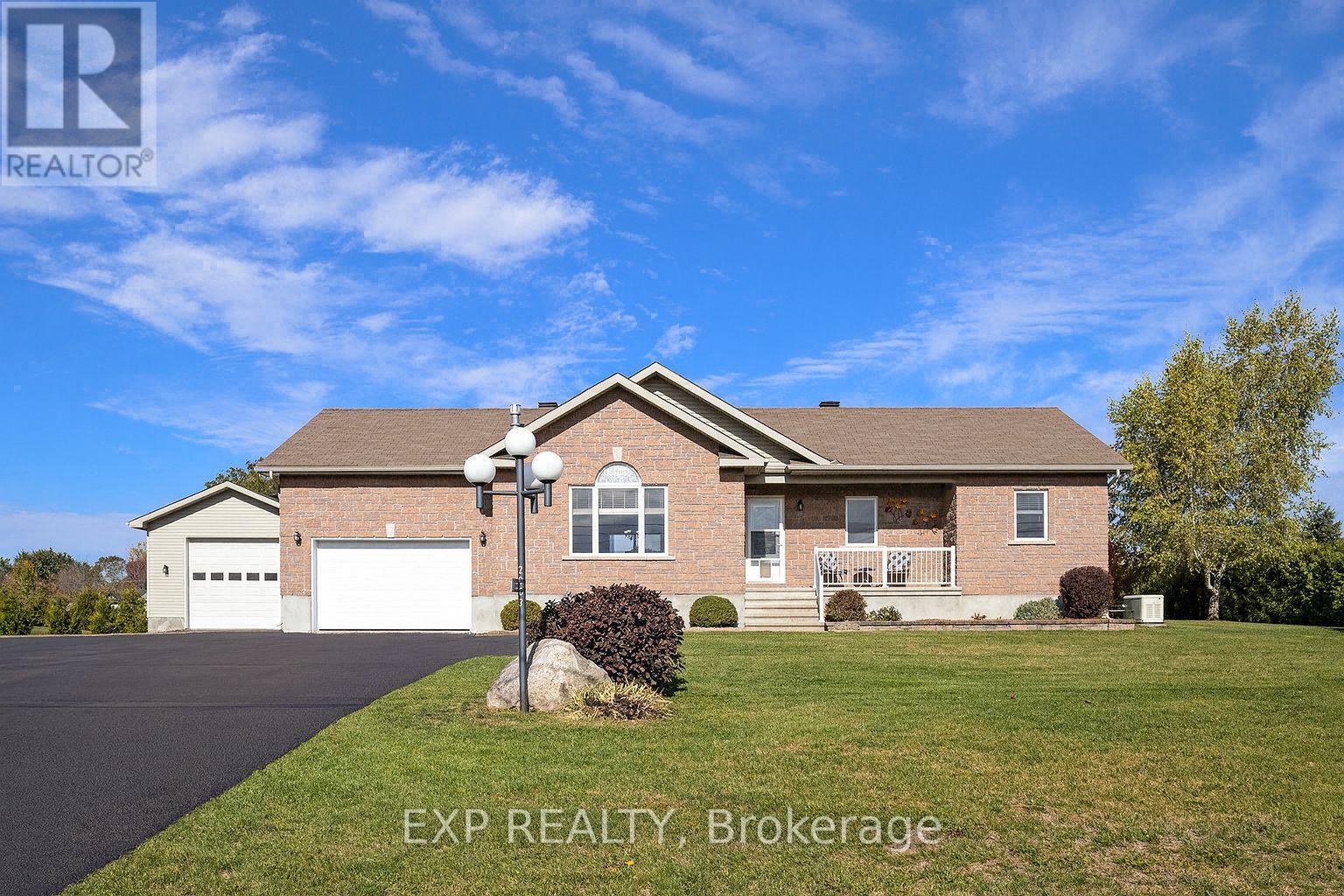 digitally altered to show paved driveway