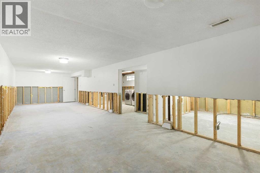 Single Family House Bungalow for Sale in  Kingsland Place SW Kingsland Calgary 