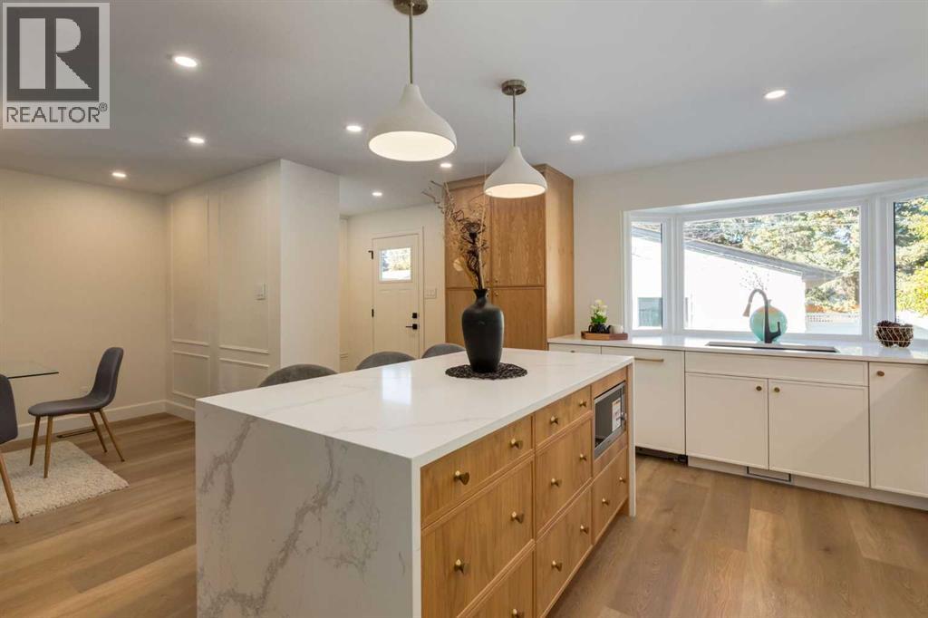 Single Family House 4 Level for Sale in  Lake Sylvan Place SE Lake Bonavista Calgary 
