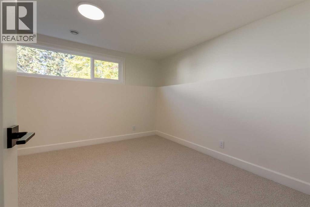 Single Family House 4 Level for Sale in  Lake Sylvan Place SE Lake Bonavista Calgary 