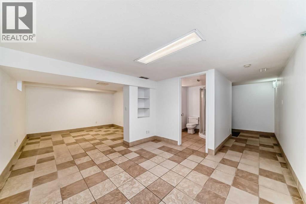 Single Family House for Sale in  Ypres Green SW Garrison Woods Calgary 