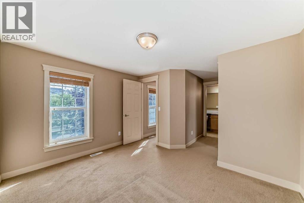 Single Family House for Sale in  Ypres Green SW Garrison Woods Calgary 