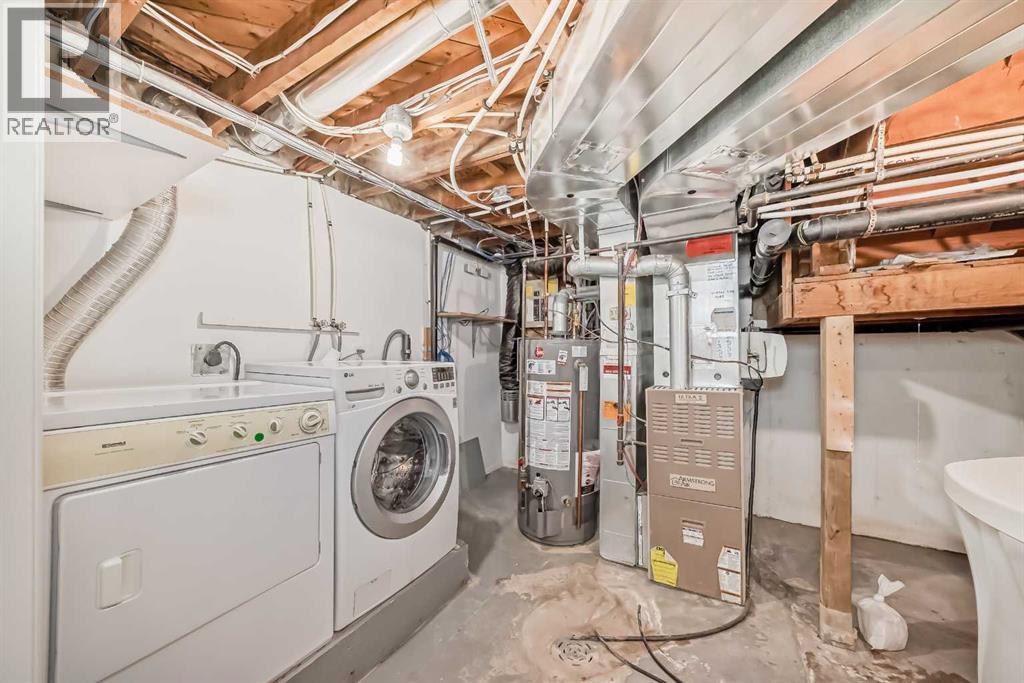 Single Family House for Sale in  Ypres Green SW Garrison Woods Calgary 