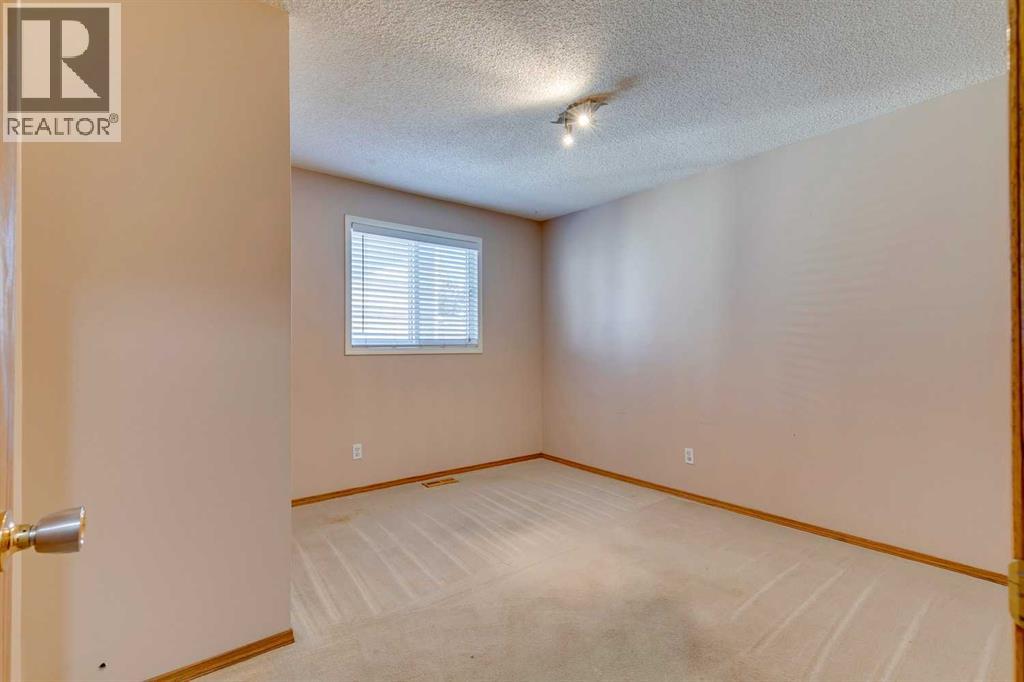 Single Family House 3 Level for Sale in  Millrise Drive SW Millrise Calgary 