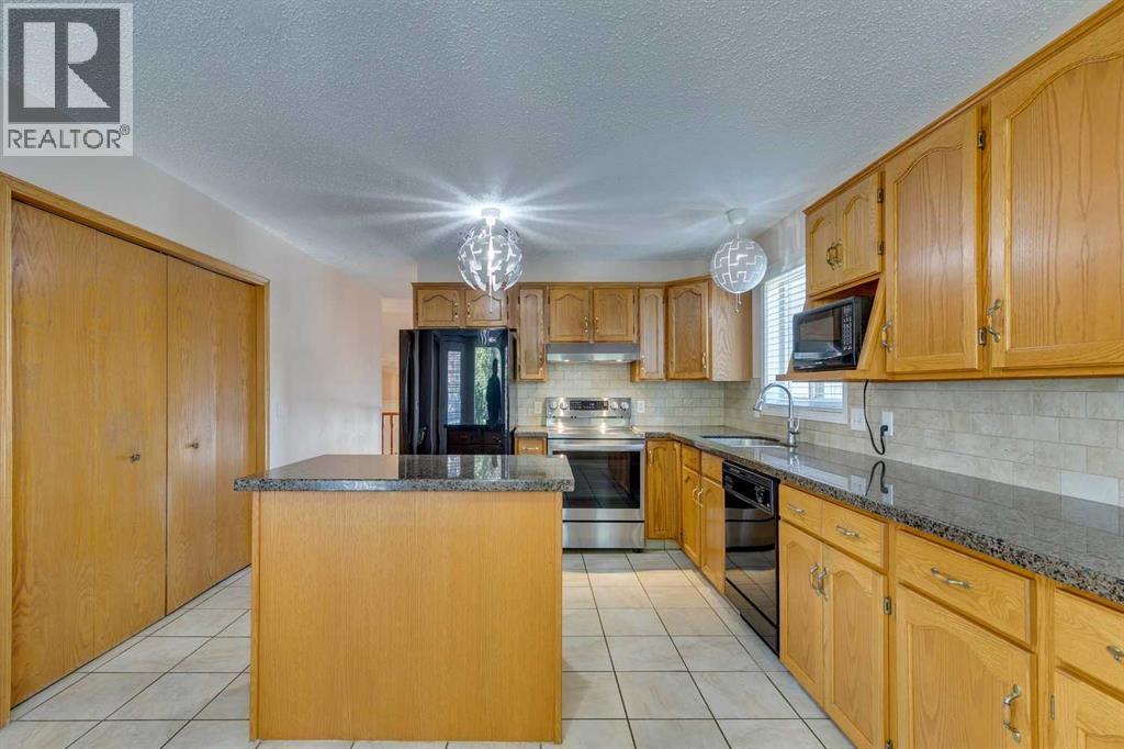 Single Family House 3 Level for Sale in  Millrise Drive SW Millrise Calgary 