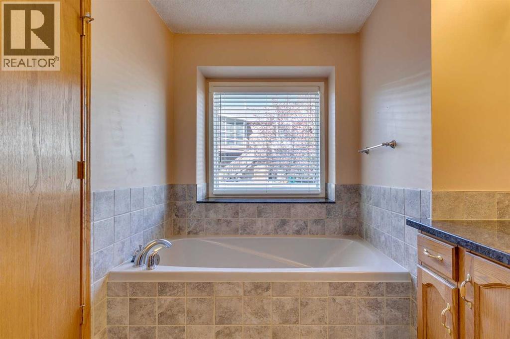 Single Family House 3 Level for Sale in  Millrise Drive SW Millrise Calgary 