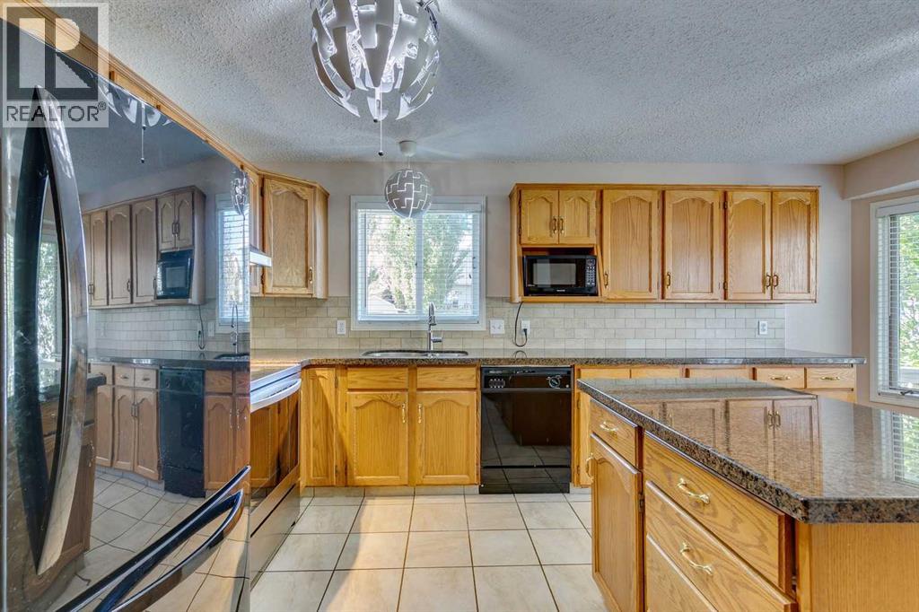 Single Family House 3 Level for Sale in  Millrise Drive SW Millrise Calgary 