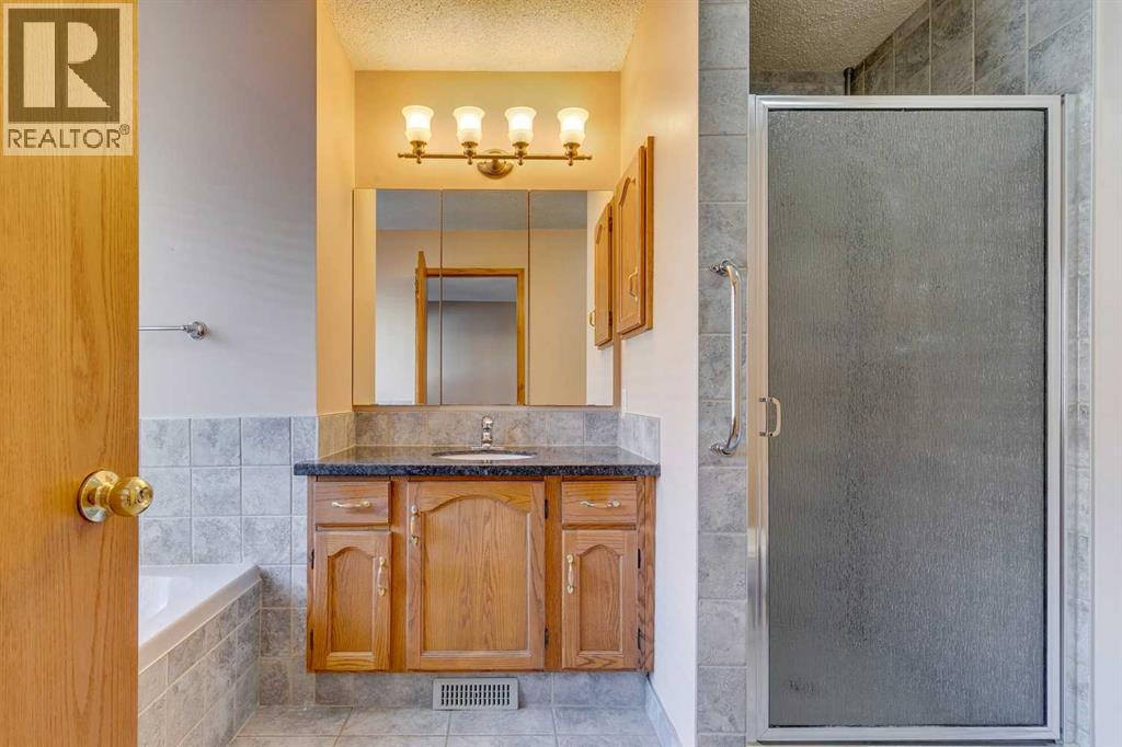 Single Family House 3 Level for Sale in  Millrise Drive SW Millrise Calgary 
