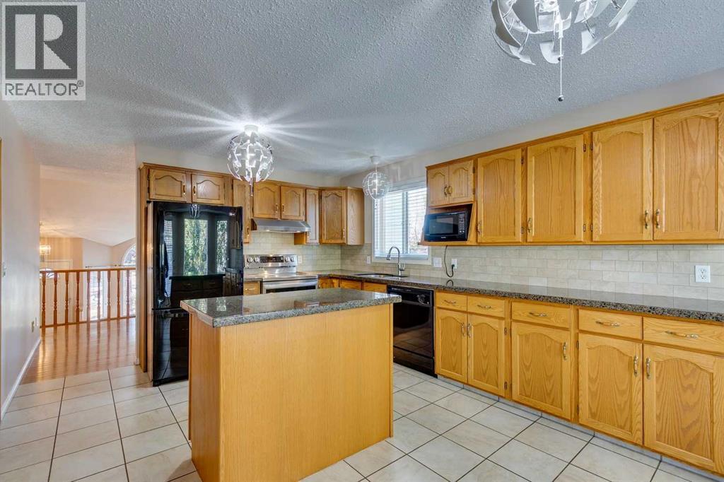 Single Family House 3 Level for Sale in  Millrise Drive SW Millrise Calgary 