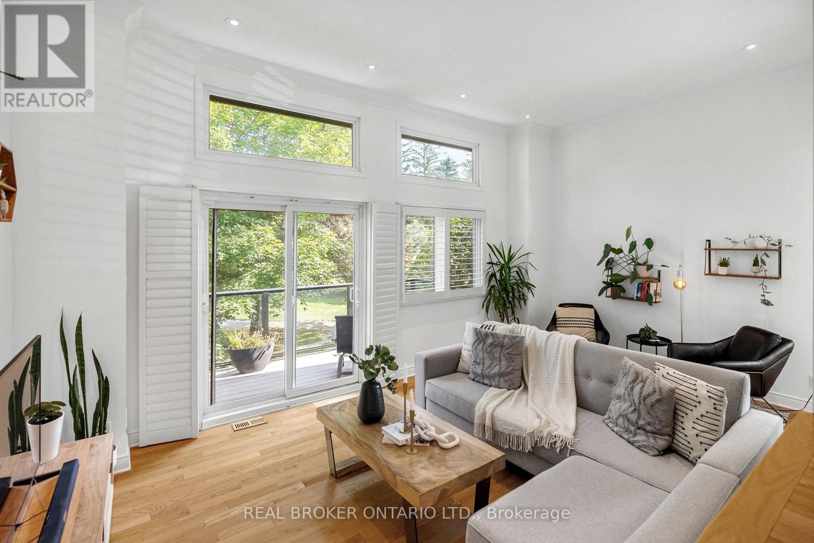 Bright and airy living room with 11ft ceilings
