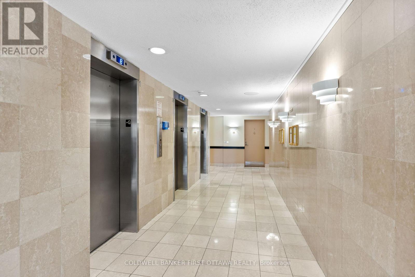 Updated main hallway access to elevators & mail.
