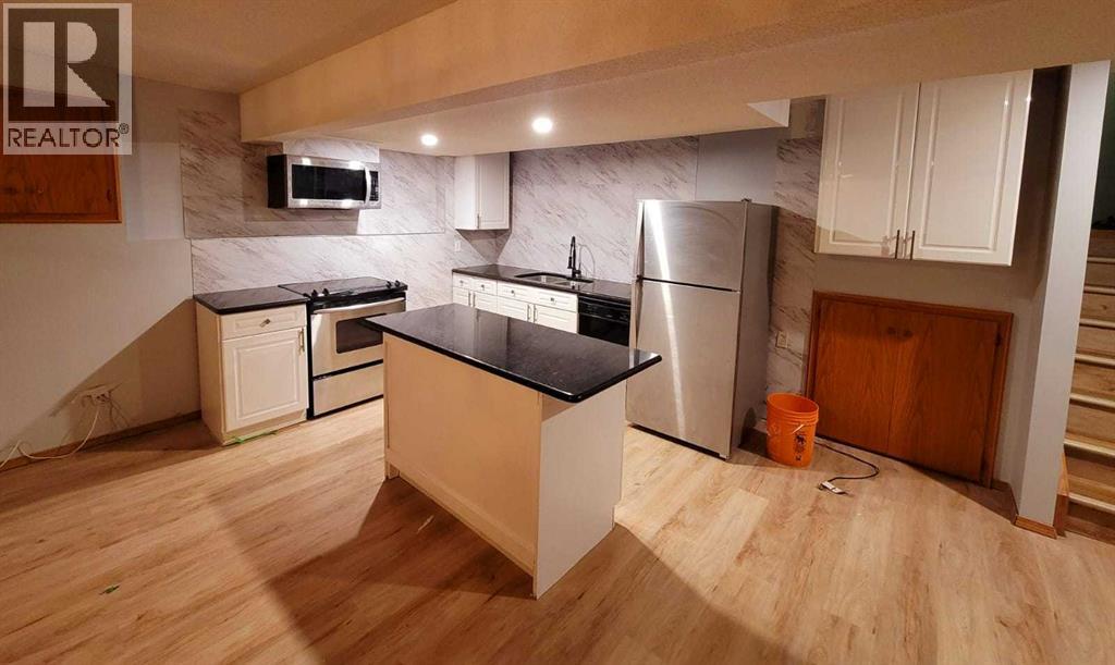 Single Family House Bi-level for Sale in  Hawkstone Drive NW Hawkwood Calgary 
