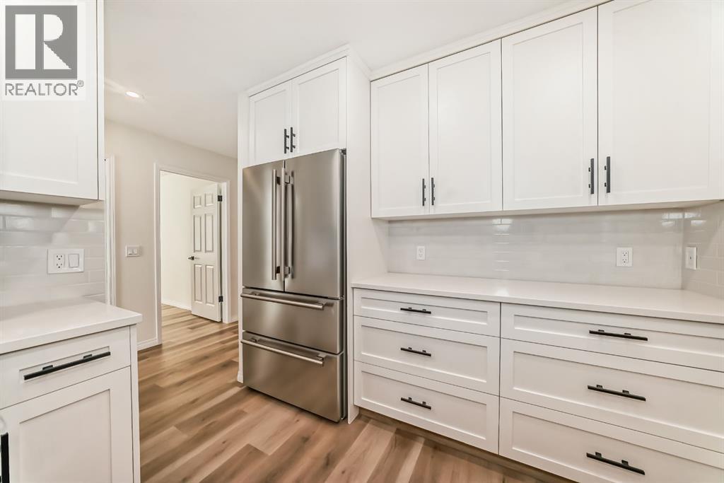 Single Family House Bungalow for Sale in  Hawkstone Manor NW Hawkwood Calgary 