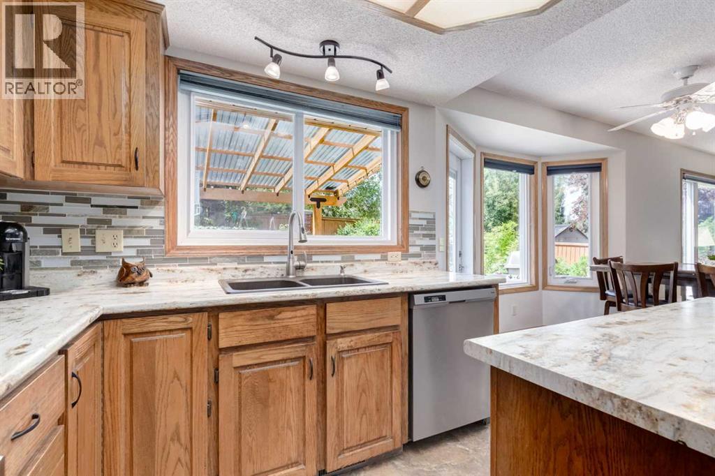 Single Family House for Sale in  Canterbury Court SW Canyon Meadows Calgary 