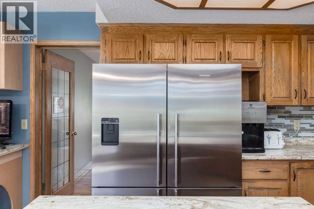 Single Family House for Sale in  Canterbury Court SW Canyon Meadows Calgary 