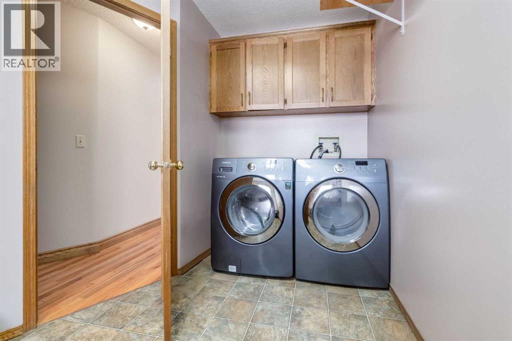 Single Family House for Sale in  Canterbury Court SW Canyon Meadows Calgary 