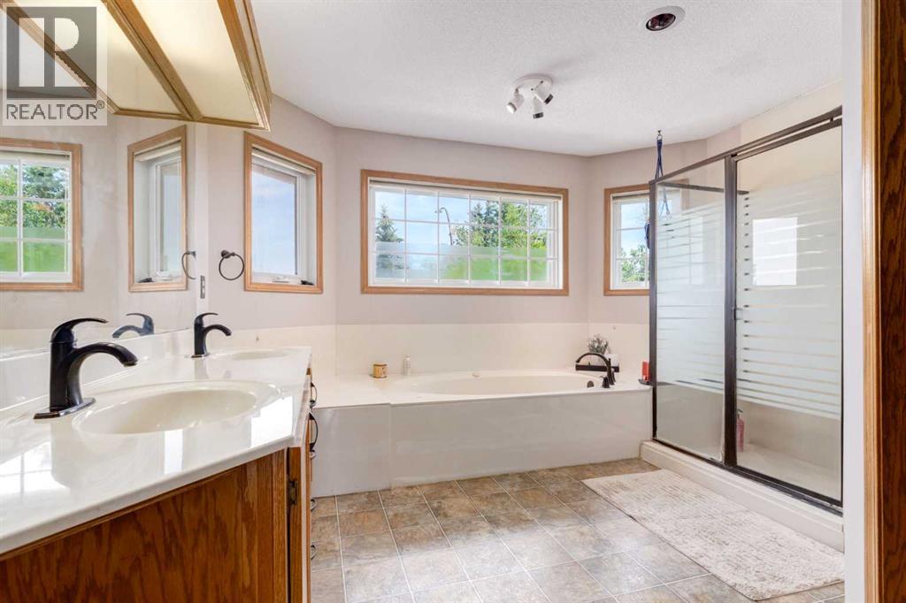 Single Family House for Sale in  Canterbury Court SW Canyon Meadows Calgary 