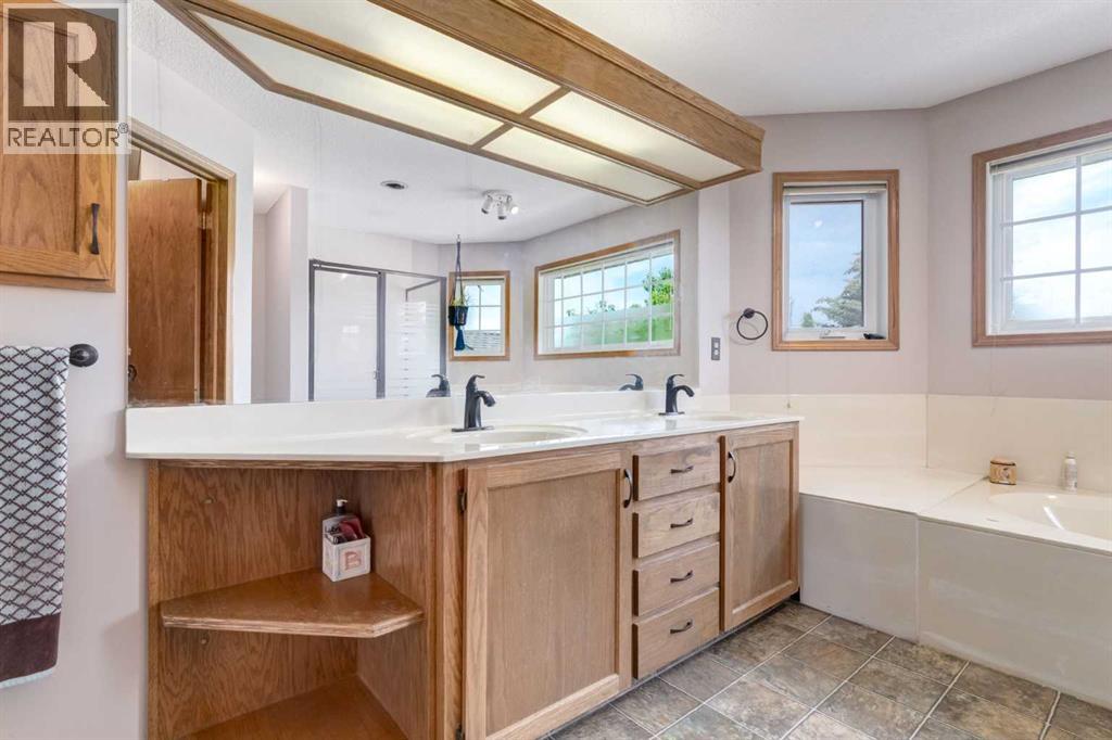 Single Family House for Sale in  Canterbury Court SW Canyon Meadows Calgary 