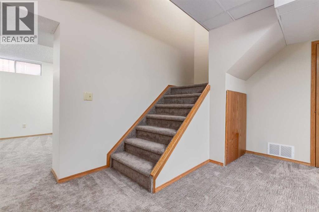 Single Family House for Sale in  Canterbury Court SW Canyon Meadows Calgary 