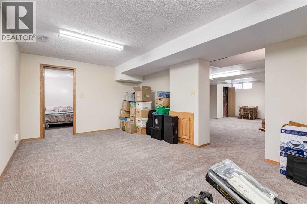 Single Family House for Sale in  Canterbury Court SW Canyon Meadows Calgary 