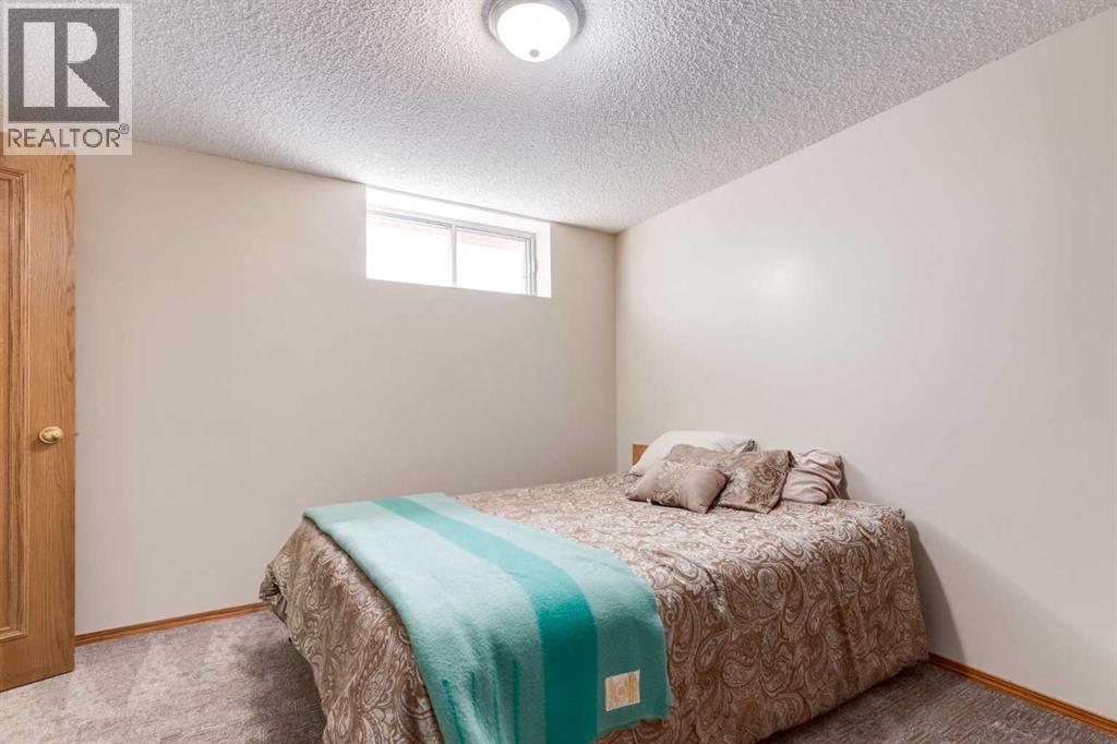 Single Family House for Sale in  Canterbury Court SW Canyon Meadows Calgary 