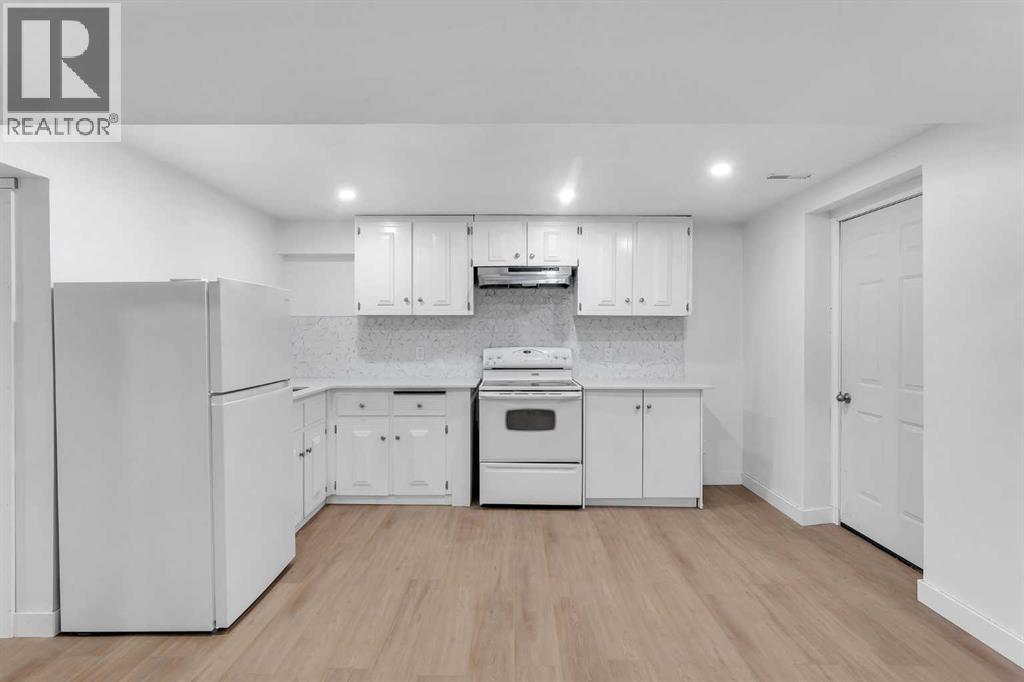 Single Family House Bi-level for Sale in  Hunterquay Way NW Huntington Hills Calgary 