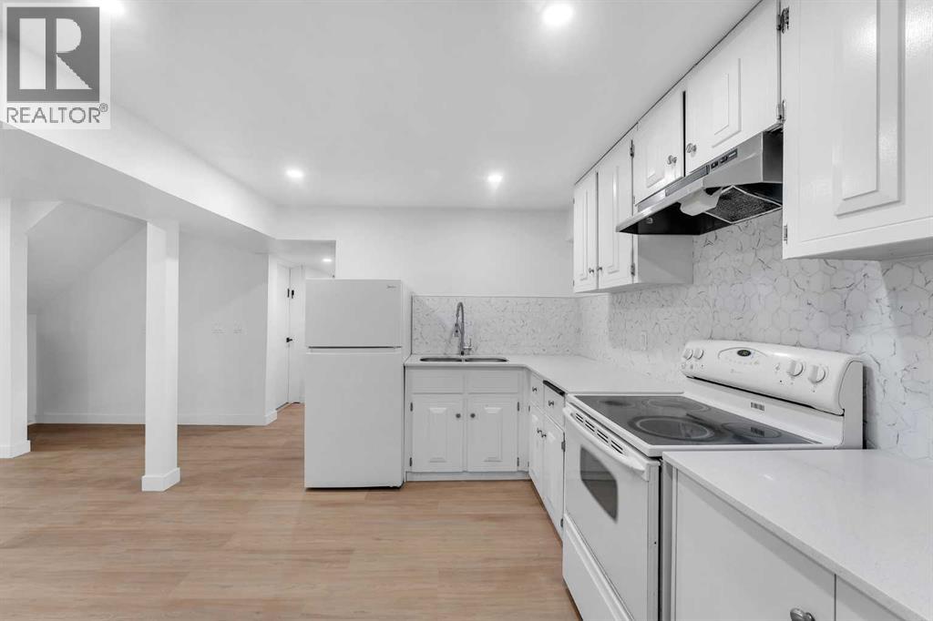 Single Family House Bi-level for Sale in  Hunterquay Way NW Huntington Hills Calgary 