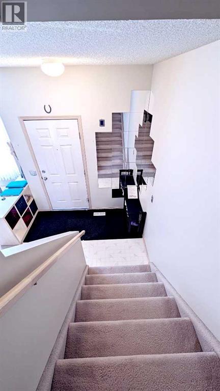 Single Family House for Sale in  Shawbrooke Court SW Shawnessy Calgary 