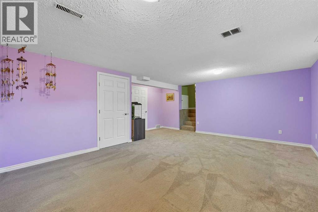 Single Family House 4 Level for Sale in  Braemar Place SW Braeside Calgary 