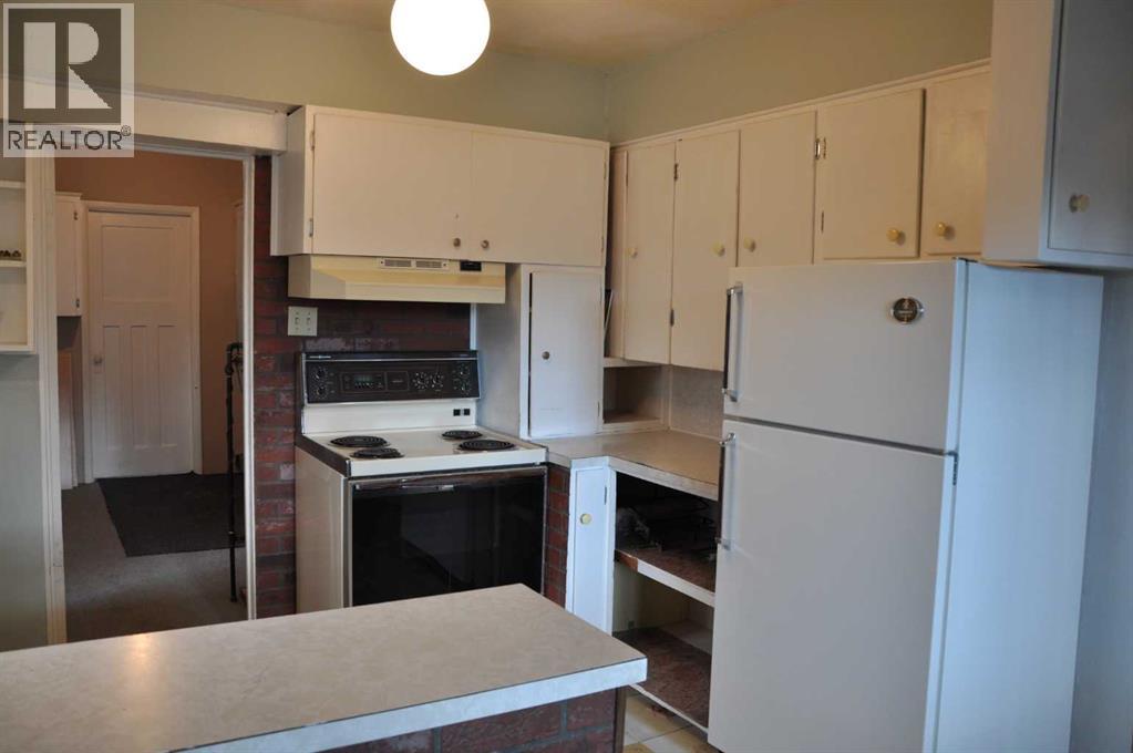 Single Family House Bungalow for Sale in   Avenue S Victoria Park Lethbridge 