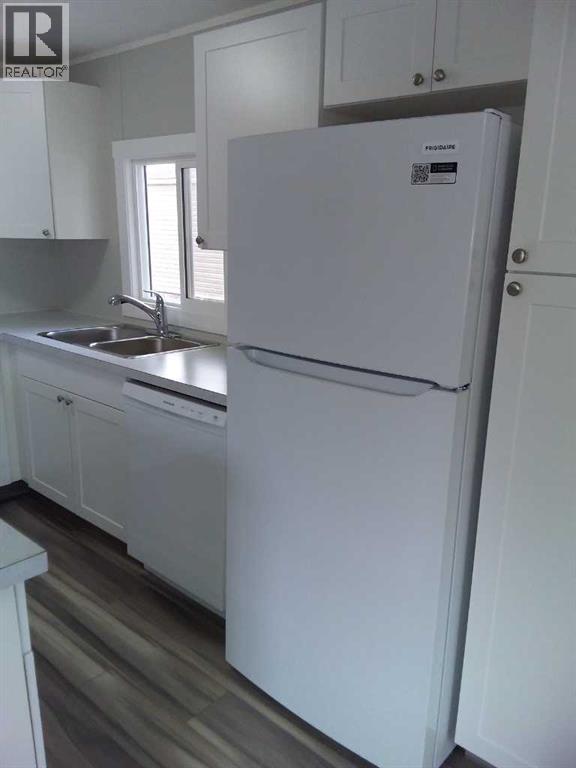 Single Family House Mobile Home for Sale in    Avenue SE Red Carpet Calgary 