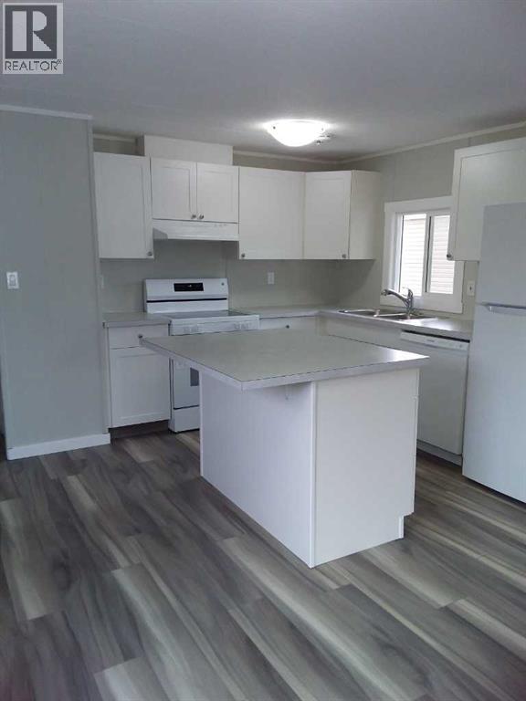 Single Family House Mobile Home for Sale in    Avenue SE Red Carpet Calgary 