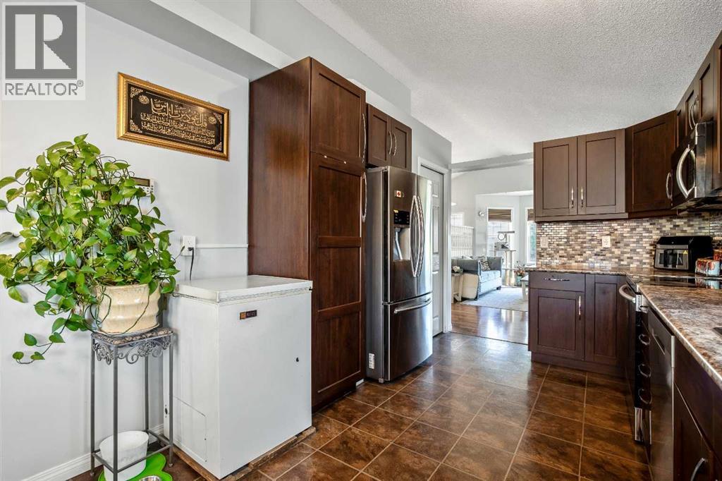 Single Family House Bi-level for Sale in  Mt Allan Circle SE McKenzie Lake Calgary 