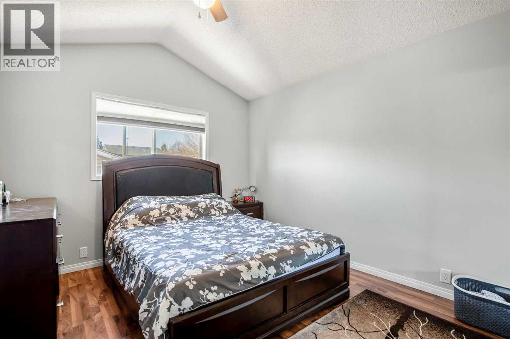 Single Family House Bi-level for Sale in  Mt Allan Circle SE McKenzie Lake Calgary 