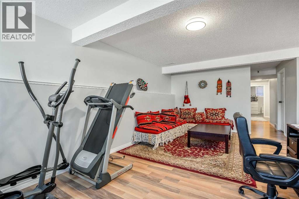 Single Family House Bi-level for Sale in  Mt Allan Circle SE McKenzie Lake Calgary 