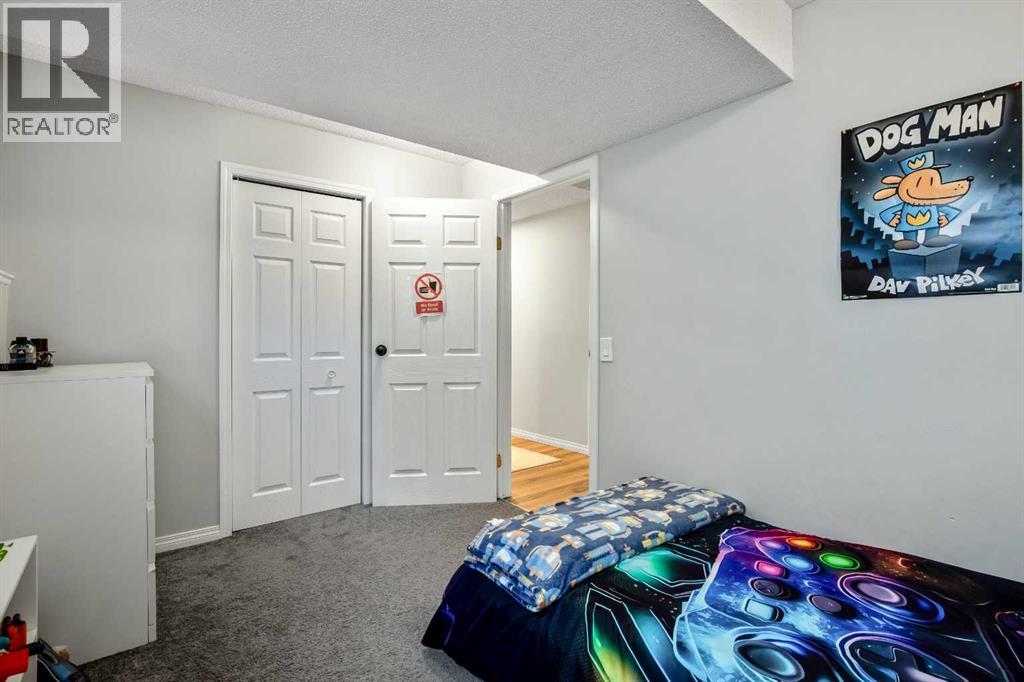 Single Family House Bi-level for Sale in  Mt Allan Circle SE McKenzie Lake Calgary 