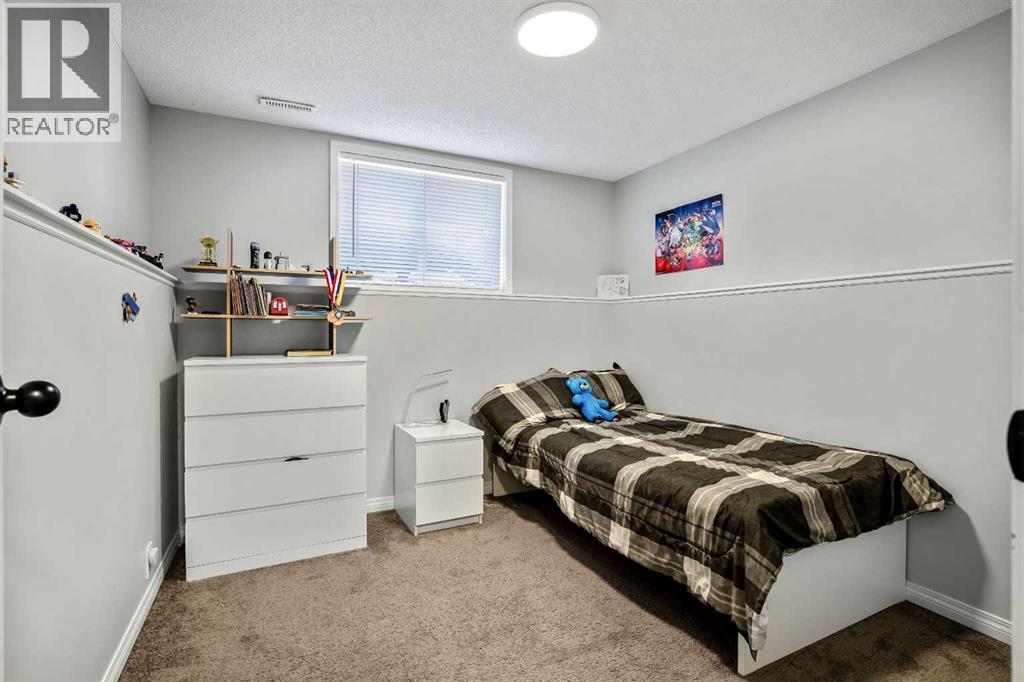Single Family House Bi-level for Sale in  Mt Allan Circle SE McKenzie Lake Calgary 