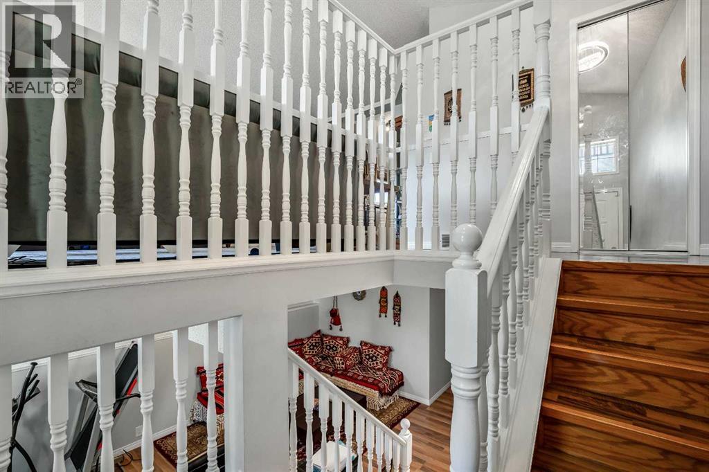 Single Family House Bi-level for Sale in  Mt Allan Circle SE McKenzie Lake Calgary 
